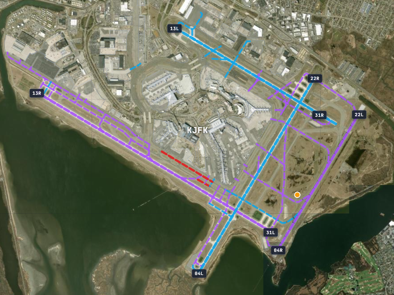 KJFK in SmartNOTAM's airport map: a violet taxiway network from unserviceable-lighting NOTAMs, cyan active runways, a red runway-end closure, and an amber obstacle dot — dozens of NOTAMs at a glance.